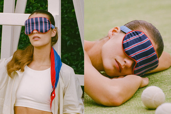 Two people wearing striped silk sleep masks, one indoors and one outdoors.