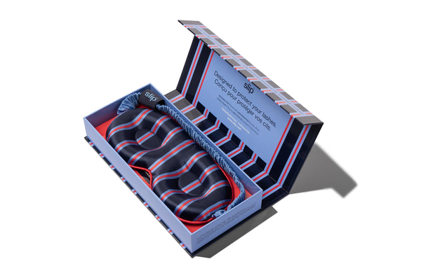 Striped contour sleep mask in a slip branded box on a white background