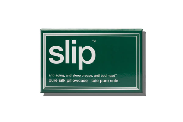 Green packaging of slip pure silk pillowcase on a white background